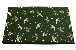Swallows on green- home decor fabric 